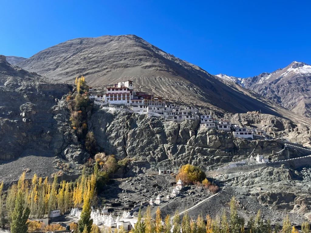 Majestic view of Diskit Monastery overlooking the valley during the vibrant Diskit Gustor Festival.
