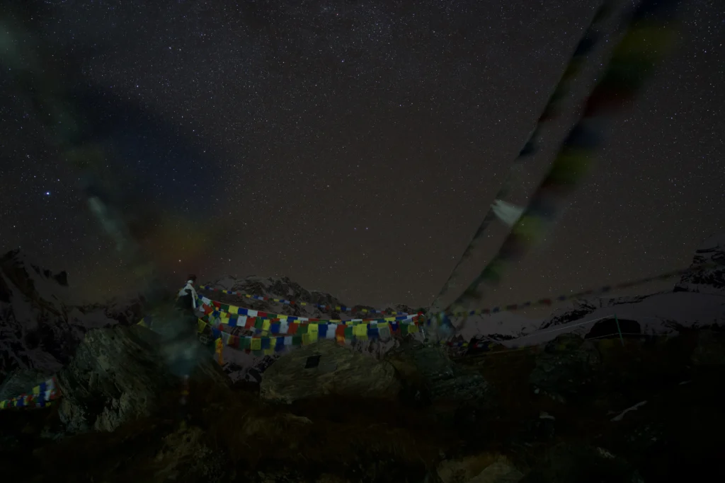 Prayer flags fly and the universe shines